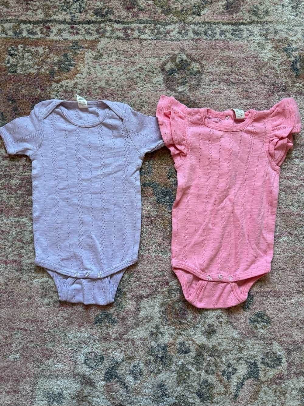 Kate Quinn pointelle onesies